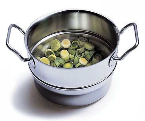 Silga Teknika Stainless Steel Steamer Insert With bright green leeks inside